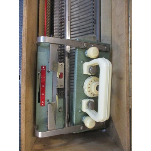 217 - A vintage Swiss Passap M-201 automatic knitting machine in a pine box A/F