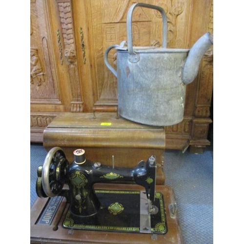 226 - A GWR watering can along with a wooden cased Jones sewing machine