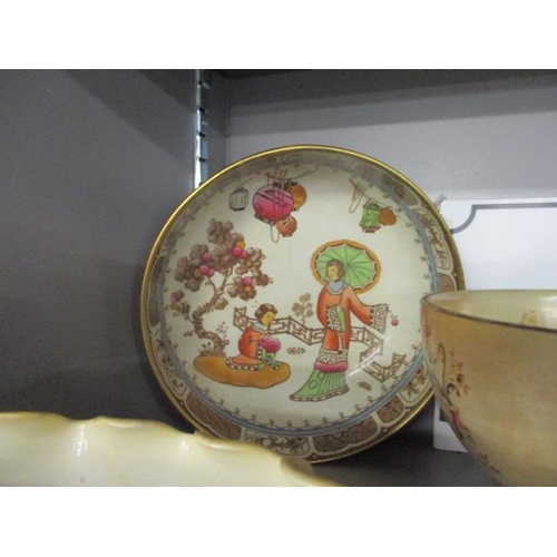 261 - An early 20th century Losol ware bowl having an oriental theme, together with a pair of Arthur Wood ... 