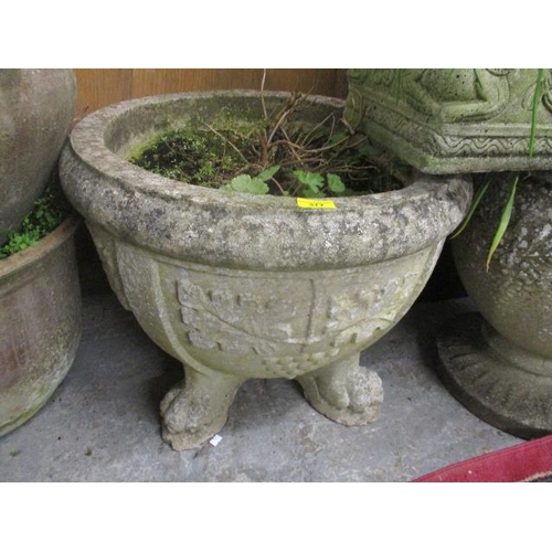 377 - A large modern circular, stoneware planter, raised on four claw feet, 19