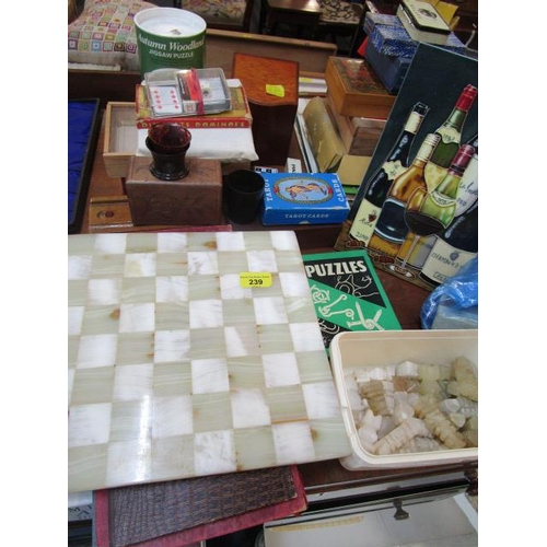 239 - A mixed lot to include a chess set, books, a boxed Japanese dolls, dominos and other items