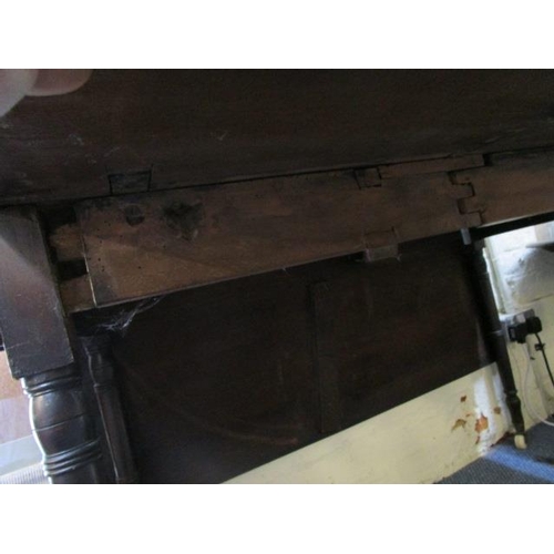 316 - A Victorian mahogany drop leaf table on turned legs