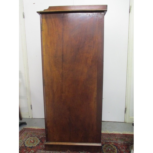 264 - A Victorian mahogany Wellington chest of eight graduated drawers with a galleried top, on a plinth, ... 