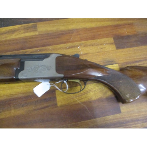 299 - A BC Miroku 12-bore double barrel under and over shotgun with fixed chokes, 28