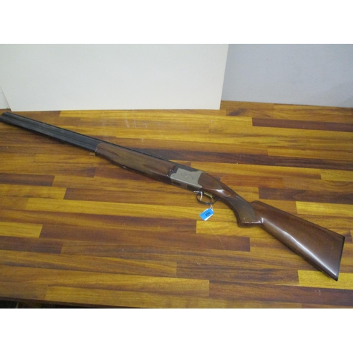 299 - A BC Miroku 12-bore double barrel under and over shotgun with fixed chokes, 28
