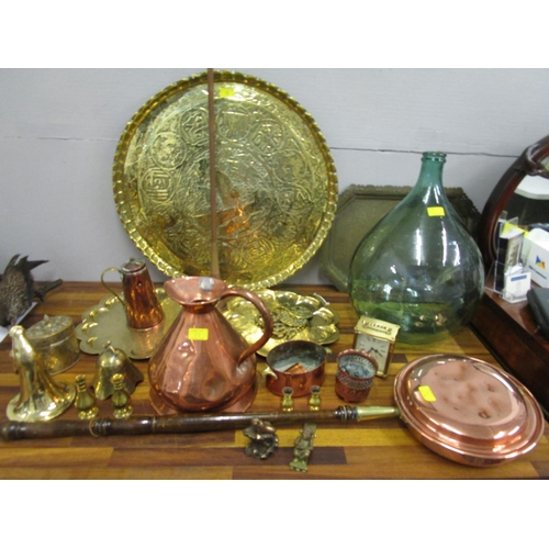 73 - Mixed copper and brassware to include a warming pan, along with a glass carboy