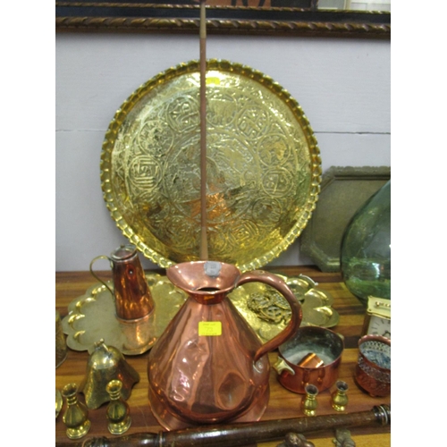 73 - Mixed copper and brassware to include a warming pan, along with a glass carboy