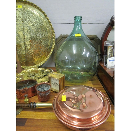 73 - Mixed copper and brassware to include a warming pan, along with a glass carboy