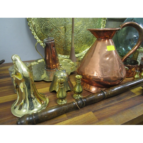 73 - Mixed copper and brassware to include a warming pan, along with a glass carboy