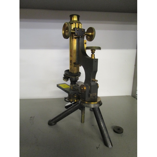 76 - A W Watson brass microscope, marked with agents address W W Scott & Co Glasgow, serial number 5930