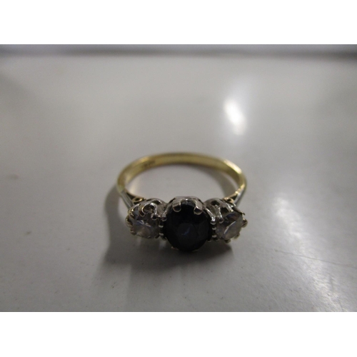 87 - An 18ct yellow gold sapphire and diamond three-stone ring, total weight 3.3g