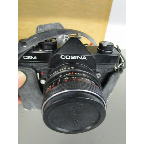 89 - A Cosina CSM camera in a leather case