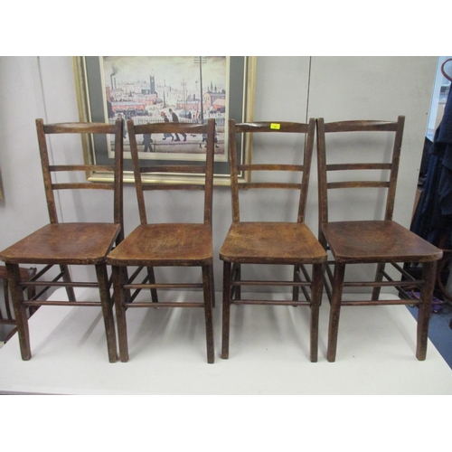 91 - A set of four early 20th century stained beech and oak chairs, with decorative seats and a televisio... 