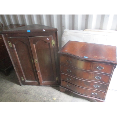 69 - A Georgian oak wall hanging corner cupboard, together with a reproduction mahogany chest of four dra... 