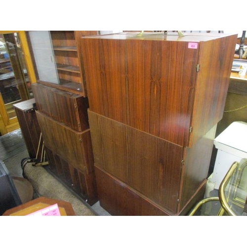 72 - A mid 20th century Ladderax style exotic wood display unit