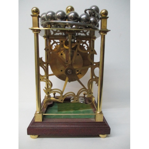 6 - A 20th century spherical rolling ball table clock, manufactured by Dove Baxeley, Cheltenham, England... 