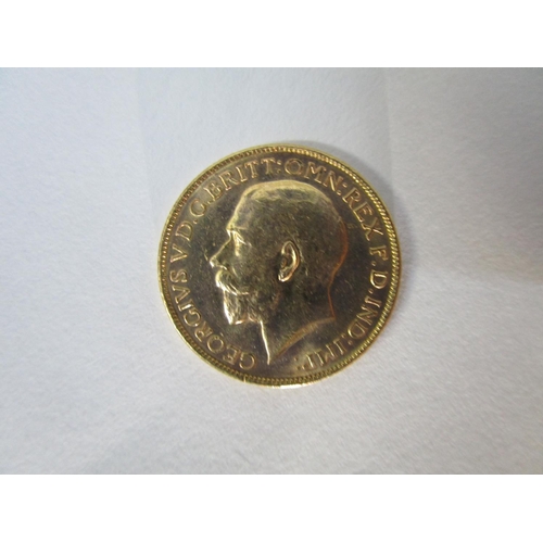 111 - A George V full gold sovereign 1914, with St George to the obverse, stamped M for Melbourne mint mar... 