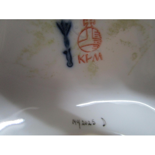 181 - A Royal Porcelain Factory, Berlin KPM figure of a man with a sheep on his back and holding a pipe, b... 