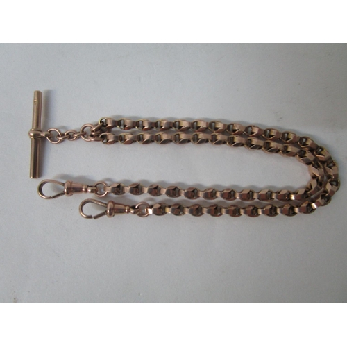 184 - A 9ct gold necklace/watch chain with fancy links and a T bar, 14