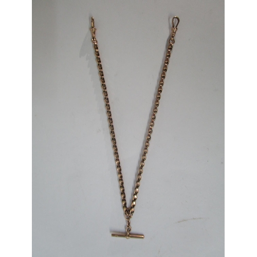 184 - A 9ct gold necklace/watch chain with fancy links and a T bar, 14