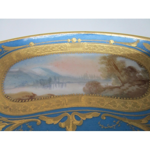 185 - A Sevres Chateaux de Dreux large cup and saucer, the cup decorated with a vignette of a boy and girl... 