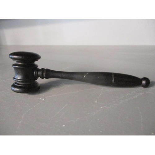 140 - A miniature or sample ebony gavel, 4 1/2