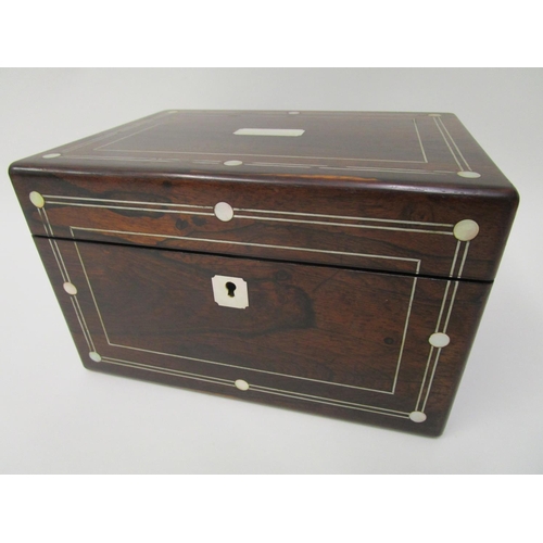 364 - A Victorian mother of pearl inlaid rosewood vanity case with a hinged lid, enclosing a green leather... 