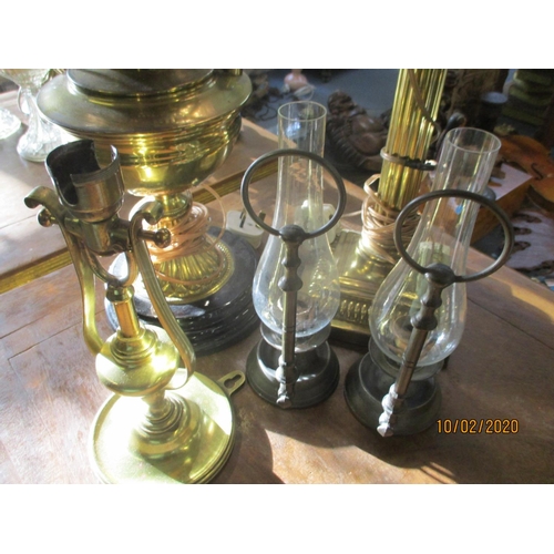 229 - Two Victorian oil lamps and three smaller lamps
Location: LWF