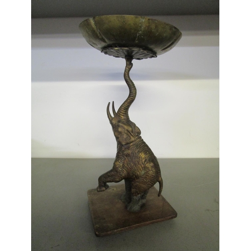 101 - A gilt metal elephant and brass centrepiece mounted on a wooden base
Location: RWB