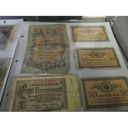 103 - A quantity of Russian and German emergency currency from the 1920s to include those with designs, al... 