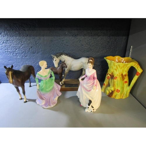 106 - A Beswick Spirit of Affection and Beswick model of a horse, along with a Burleigh ware rabbit and th... 