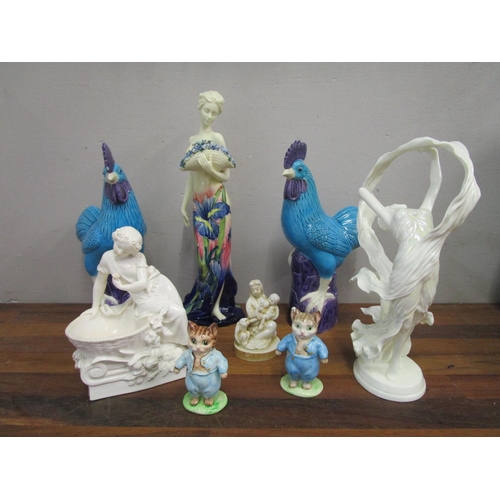 110 - A group of ceramic figurines to include a Copeland figural salt, Old Tupton ware figurine, Royal Wor... 