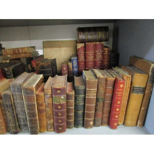 111 - A selection of antiquarian leather bound books and others to include three volumes of Movement du Mo... 