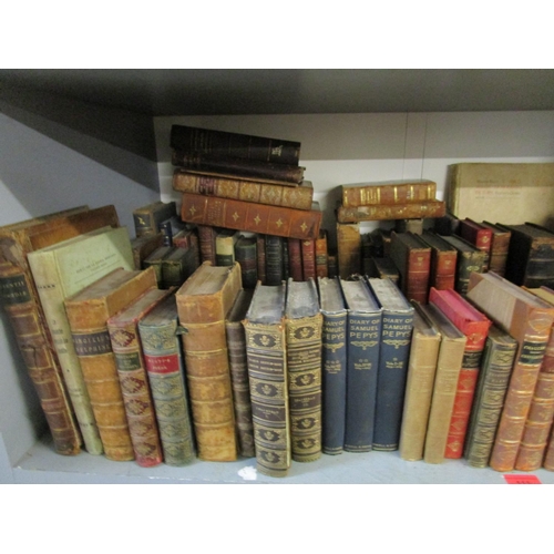 111 - A selection of antiquarian leather bound books and others to include three volumes of Movement du Mo... 