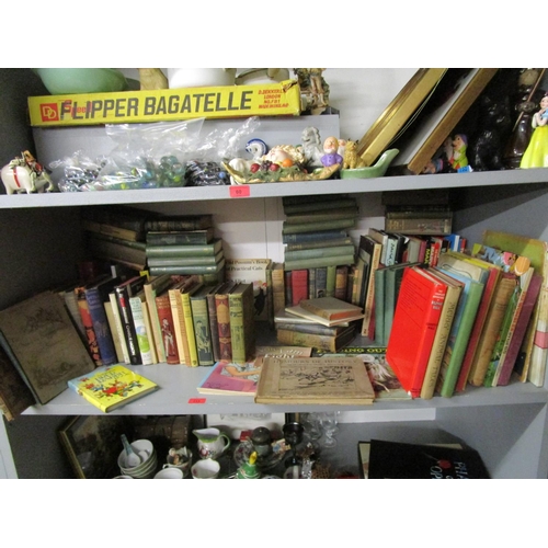 113 - A shelf of mainly children's books and annuals to include T S Eliot's Old Possum's Book of Practical... 