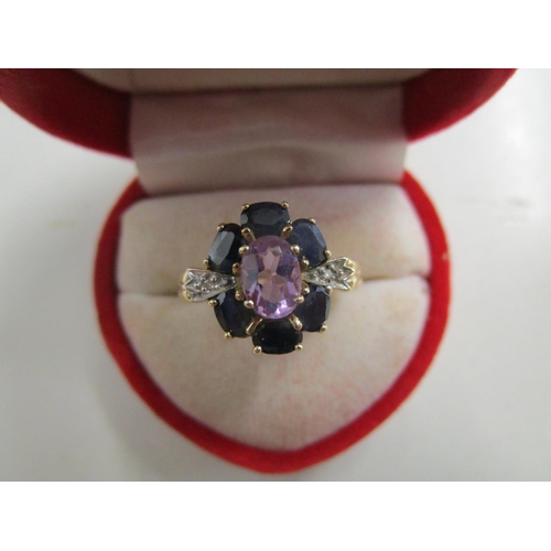 124 - A 10ct gold sapphire, diamond and amethyst set cluster ring
Location: CAB