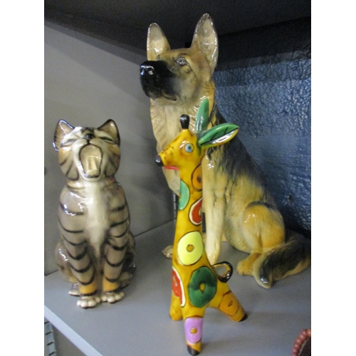 168 - A large Beswick model of an Alsatian dog, a china model of a cat and a giraffe
Location: 3:1