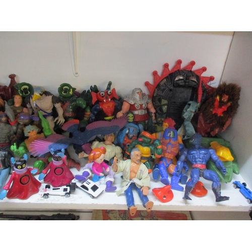 241 - A quantity of 1980s toy figures to include Teenage Mutant Ninja Turtles and other toys. Location:1.3