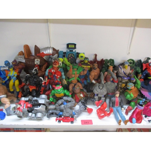 241 - A quantity of 1980s toy figures to include Teenage Mutant Ninja Turtles and other toys. Location:1.3