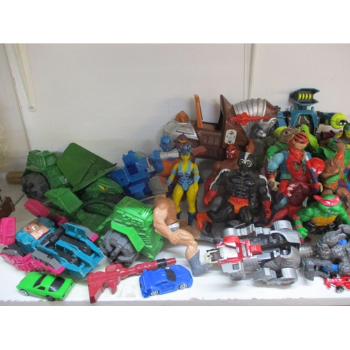 241 - A quantity of 1980s toy figures to include Teenage Mutant Ninja Turtles and other toys. Location:1.3