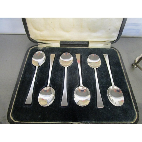 262 - A cased set of six silver spoons, Sheffield 1919 marks for Thomas Bradbury & Sons, a silver toast ra... 