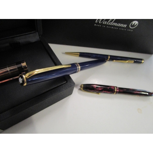 270 - A Mont Blanc Generation propelling pencil, a Conway Stewart Dinky fountain pen with 14ct gold nib, a... 