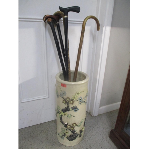 66 - A stick stand with assorted sticks, possibly Chinese
Location: FOYER