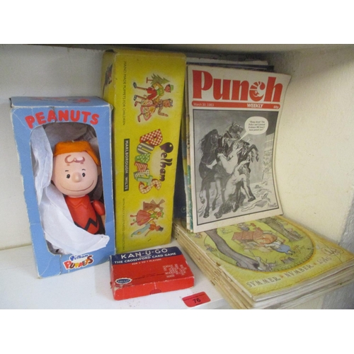 76 - A mixed lot to include a boxed Pelham puppet, a Peanuts Pelham puppet, Kan-u-Go card game and a sele... 