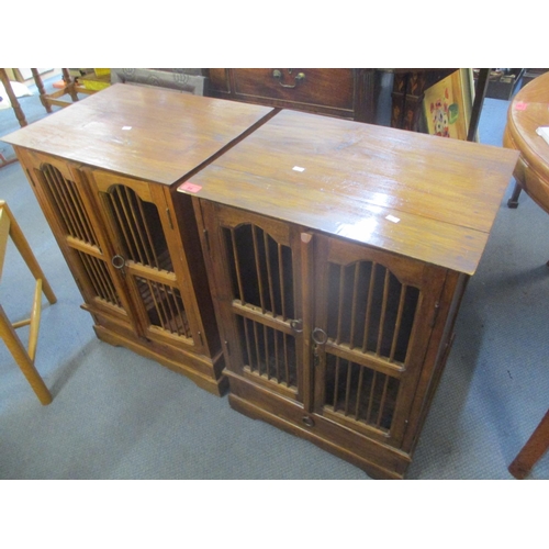 84 - A pair of modern cabinets having spindle front cupboard doors with a single drawer below 29 1/2