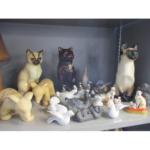 85 - Mixed animal figures to include a Winstanley 34 cat, Royal Copenhagen sea lion and others
Location: ... 