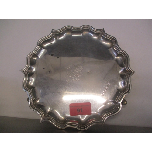 91 - An early 20th century silver card tray standing on three hoof feet
Location: LAM