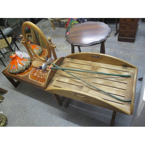 299 - Edwardian and vintage furniture to include a butler's tray, a tiled top table, a swing mirror, a lig... 