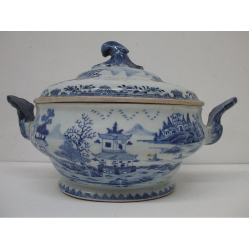 21 - A late 18th century Chinese tureen and cover with a domed lid and wave finial, a bellied, tapered bo... 