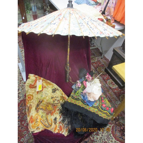 198 - An early 20th century crushed velvet table throw in burgundy with tassels, an early 20th century Ori... 